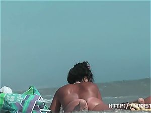 naturist beach flick introduces fine looking bare honeys