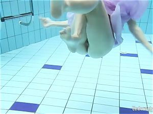 ebony haired Aneta in the pool